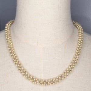 Hand stitched drop necklace